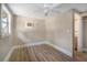 Spacious bedroom with ceiling fan and neutral walls at 3105 W Spruce St, Tampa, FL 33607