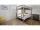 Bedroom with full-size bed and bunk bed at 3105 W Spruce St, Tampa, FL 33607
