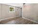 Simple bedroom with wood flooring and neutral tones at 3105 W Spruce St, Tampa, FL 33607