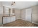 Updated kitchen with white cabinets, wood countertops, and new flooring at 3105 W Spruce St, Tampa, FL 33607