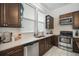Bright kitchen with ample counter space and wood cabinets at 3105 W Spruce St, Tampa, FL 33607