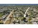 Aerial view showing the home's location near a body of water at 3108 Ash Ct, Dunedin, FL 34698