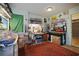 Bright and spacious art studio, complete with work tables and storage at 3108 Ash Ct, Dunedin, FL 34698
