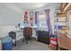 Spacious home office with wood floors and dual computer stations at 3108 Ash Ct, Dunedin, FL 34698