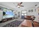 Living room showcasing ample natural light and comfortable seating arrangement at 3108 Ash Ct, Dunedin, FL 34698
