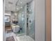 Spa-like bathroom featuring a freestanding tub, a glass shower, and modern fixtures at 380 Pinellas Bayway S. # E, Tierra Verde, FL 33715
