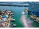 An aerial view of a waterfront condo with a boat dock. Enjoy the sun and fun! at 51 Island Way # 1004, Clearwater Beach, FL 33767