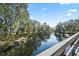 Serene waterway view from wooden bridge at 6003 Laketree Ln # L, Temple Terrace, FL 33617