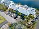 Beautiful condo aerial view with lots of parking and luscious palm trees at 611 Destiny Dr # 410, Ruskin, FL 33570