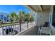 Enjoy the covered balcony with views of palm trees at 611 Destiny Dr # 410, Ruskin, FL 33570