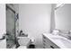Well-lit bathroom with a white vanity, marble accents, and sleek fixtures at 611 Destiny Dr # 410, Ruskin, FL 33570
