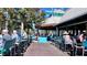 Inviting outdoor dining area with a covered patio, offering a relaxed and casual atmosphere at 611 Destiny Dr # 410, Ruskin, FL 33570