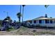 Exterior of a waterfront restaurant with outdoor seating and sunny skies at 611 Destiny Dr # 410, Ruskin, FL 33570
