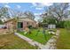 Backyard with artificial turf, playset and shed at 651 Southwest N Blvd, St Petersburg, FL 33703