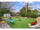 Backyard with artificial turf and playset at 651 Southwest N Blvd, St Petersburg, FL 33703