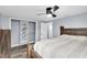 Main bedroom with walk-in closet and built-in shelving at 7014 Ivanhoe Dr, Port Richey, FL 34668