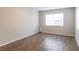 Bright bedroom with wood-look floors and neutral walls at 7124 Waterside Dr # 7124, Tampa, FL 33617