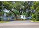 Gated community entrance with lush landscaping and security booth at 7124 Waterside Dr # 7124, Tampa, FL 33617