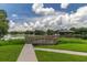 Wooden dock with gazebo on a lake at 7124 Waterside Dr # 7124, Tampa, FL 33617