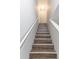 Indoor staircase with wood-look laminate treads at 7124 Waterside Dr # 7124, Tampa, FL 33617