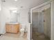 Clean bathroom with shower and granite vanity at 777 N Ashley Dr # 2503, Tampa, FL 33602
