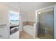 Bathroom with bathtub, shower, and view into bedroom at 777 N Ashley Dr # 2503, Tampa, FL 33602