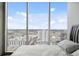Bedroom with stunning city views from large windows at 777 N Ashley Dr # 2503, Tampa, FL 33602