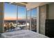 Bedroom with city views and private balcony access at 777 N Ashley Dr # 2503, Tampa, FL 33602