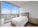 Bedroom with city view and wood flooring at 777 N Ashley Dr # 2503, Tampa, FL 33602