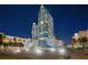 Night view of a modern high-rise building in a city setting at 777 N Ashley Dr # 2503, Tampa, FL 33602