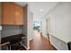 Bright hallway with built-in desk and cabinets, leading to living area at 777 N Ashley Dr # 2503, Tampa, FL 33602