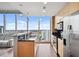 Modern kitchen with stainless steel appliances and city views at 777 N Ashley Dr # 2503, Tampa, FL 33602