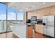 Modern kitchen with stainless steel appliances and city views at 777 N Ashley Dr # 2503, Tampa, FL 33602