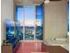 Living room with city views from floor-to-ceiling windows at 777 N Ashley Dr # 2503, Tampa, FL 33602