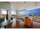 Open-concept living room with city views and hardwood floors at 777 N Ashley Dr # 2503, Tampa, FL 33602