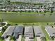 Aerial view showcasing home's location in a lakefront community at 9608 Ivory Dr, Ruskin, FL 33573
