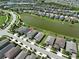 Aerial view of the house and surrounding neighborhood at 9608 Ivory Dr, Ruskin, FL 33573