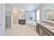 Large bathroom with soaking tub and double vanity at 9608 Ivory Dr, Ruskin, FL 33573