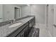 Bathroom boasts double sinks and granite countertop at 9608 Ivory Dr, Ruskin, FL 33573