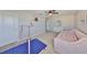 Bright bedroom featuring a daybed, dresser, and gymnastics equipment at 9608 Ivory Dr, Ruskin, FL 33573