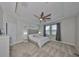 Main bedroom with ceiling fan and walk-in closet at 9608 Ivory Dr, Ruskin, FL 33573