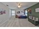Spacious bedroom with two twin beds and ample closet space at 9608 Ivory Dr, Ruskin, FL 33573