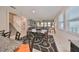 Open dining room with table and chairs, adjacent to living room at 9608 Ivory Dr, Ruskin, FL 33573