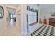 Bright entryway with built-in bench seating and storage at 9608 Ivory Dr, Ruskin, FL 33573