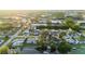 Aerial view of a neighborhood with canal access and a variety of boat docks at 9665 2Nd N St, St Petersburg, FL 33702