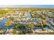 Expansive aerial view of canal-front homes, highlighting water access and the peaceful residential setting at 9665 2Nd N St, St Petersburg, FL 33702