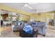 The open-concept living room is bright and inviting with natural light and stylish decor at 9665 2Nd N St, St Petersburg, FL 33702