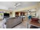 The open-concept living room provides seamless flow and an easy transition to the kitchen and dining areas at 9665 2Nd N St, St Petersburg, FL 33702