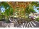 This covered pergola creates a backyard gathering space at 9665 2Nd N St, St Petersburg, FL 33702