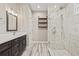 Modern bathroom with double vanity and glass shower at 1012 River Heights Ave, Tampa, FL 33603